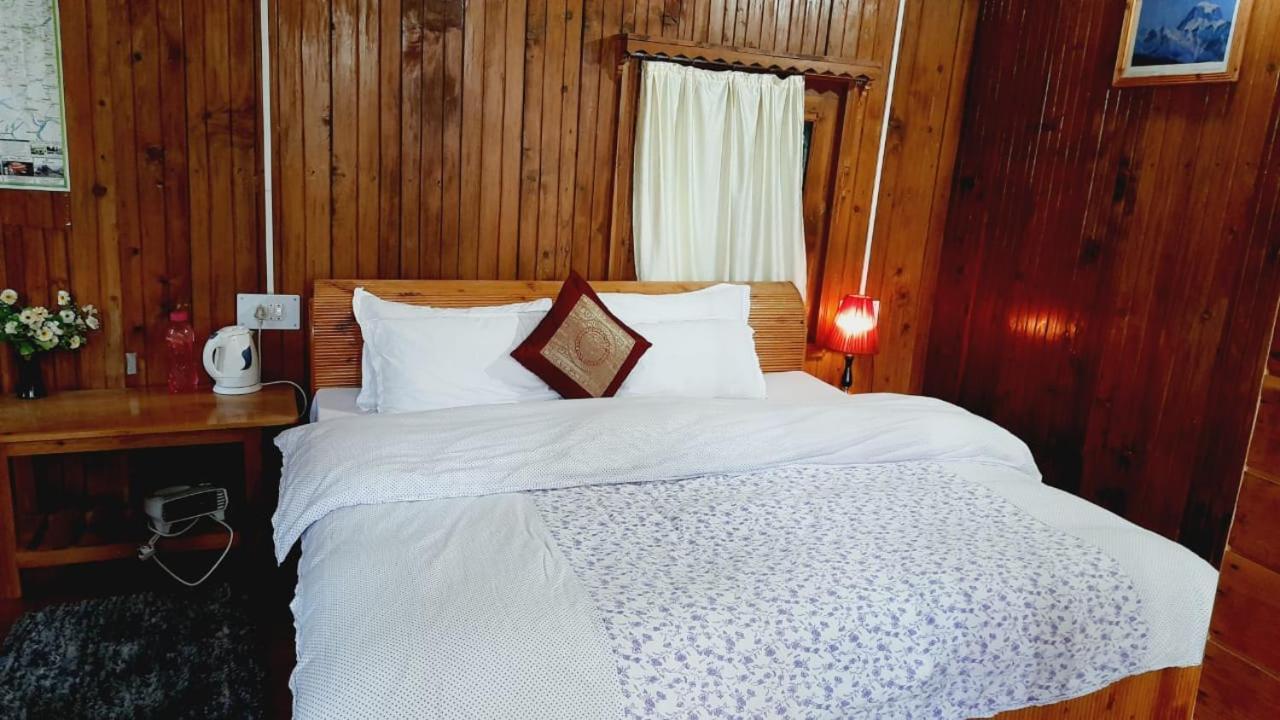 Ishan Log Huts-A Boutique Home Stay Banjār Exteriör bild